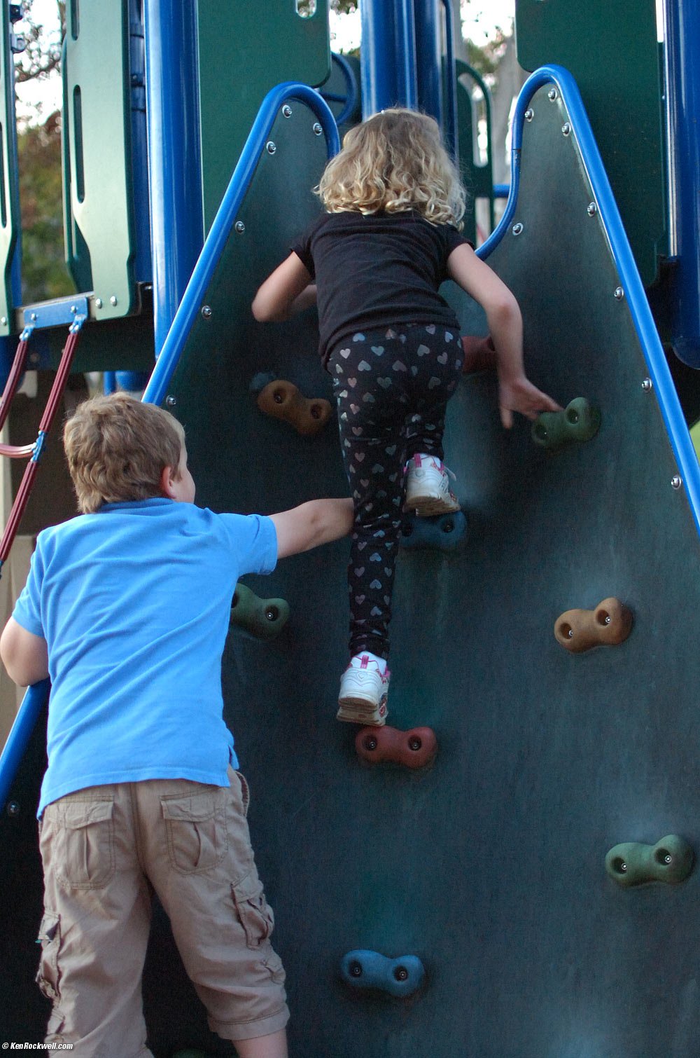 Katie and Ryan climbing at the park.