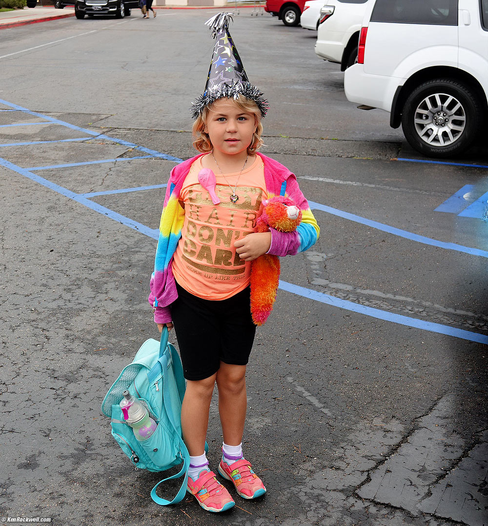 Katie goes to school in her birthday suit