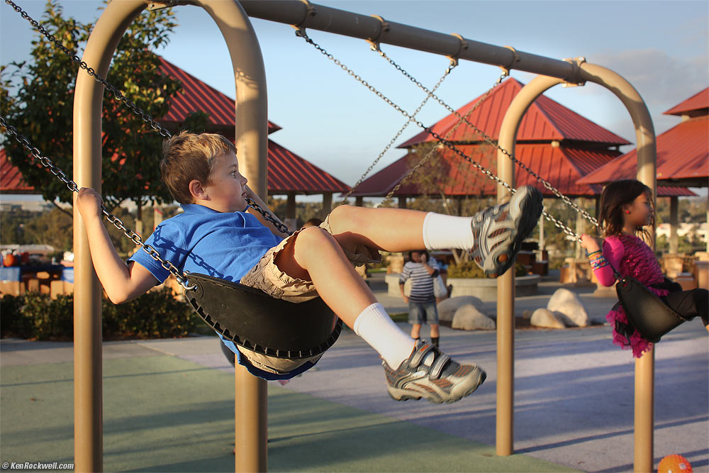 Ryan swinging at the park.