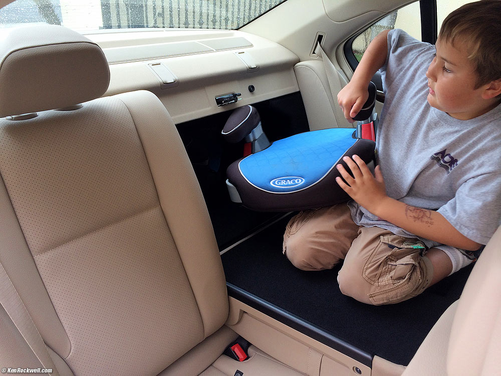 Ryan climbs in through the trunk of the 2014 Mercedes C250 sport