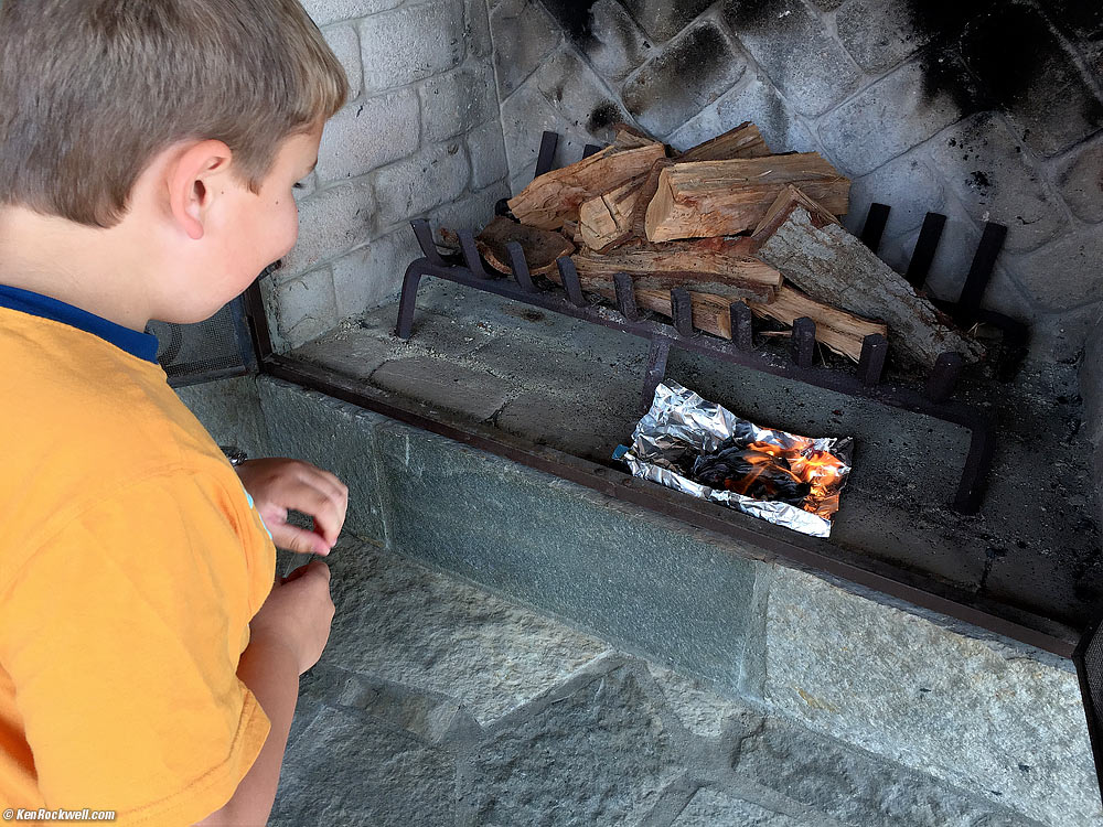 Ryan likes the fire Dada started with a magnesium fire starter
