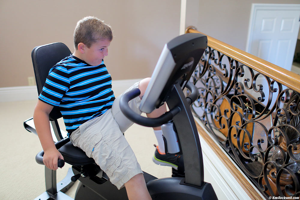 Ryan on Noni's exercise machine
