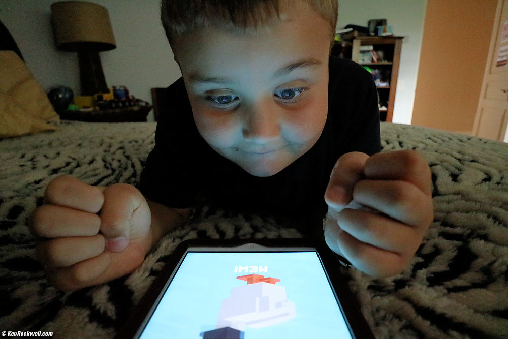 Ryan plays on Dad's iPad Mini.