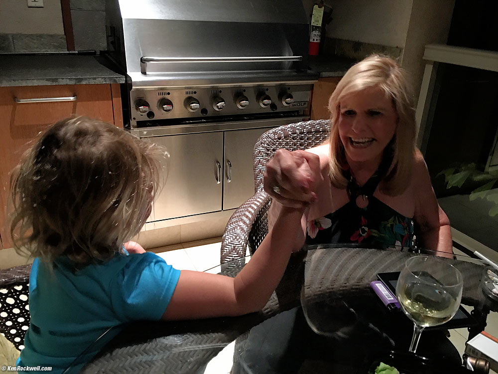 Katie challenges Noni to an arm wrestle