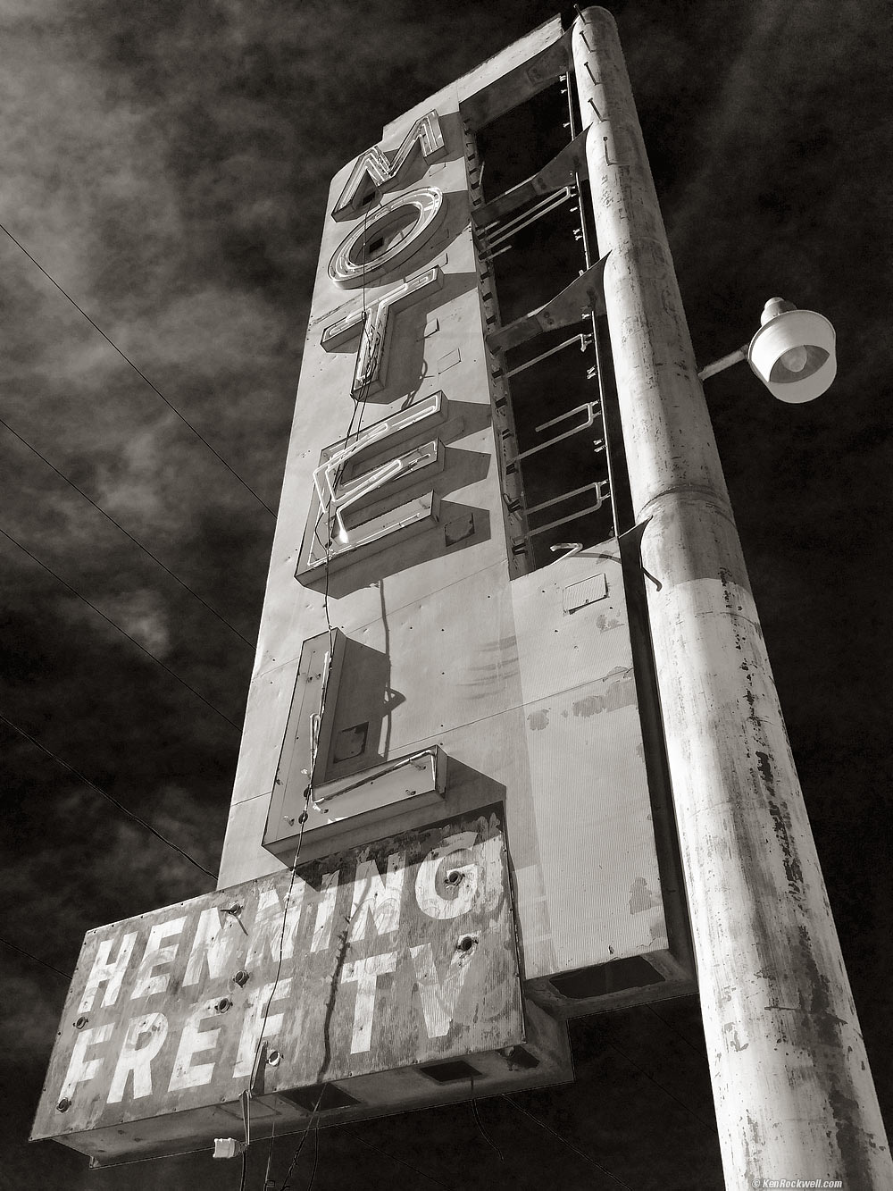 Motel Henning sign, vertical,  in black and white