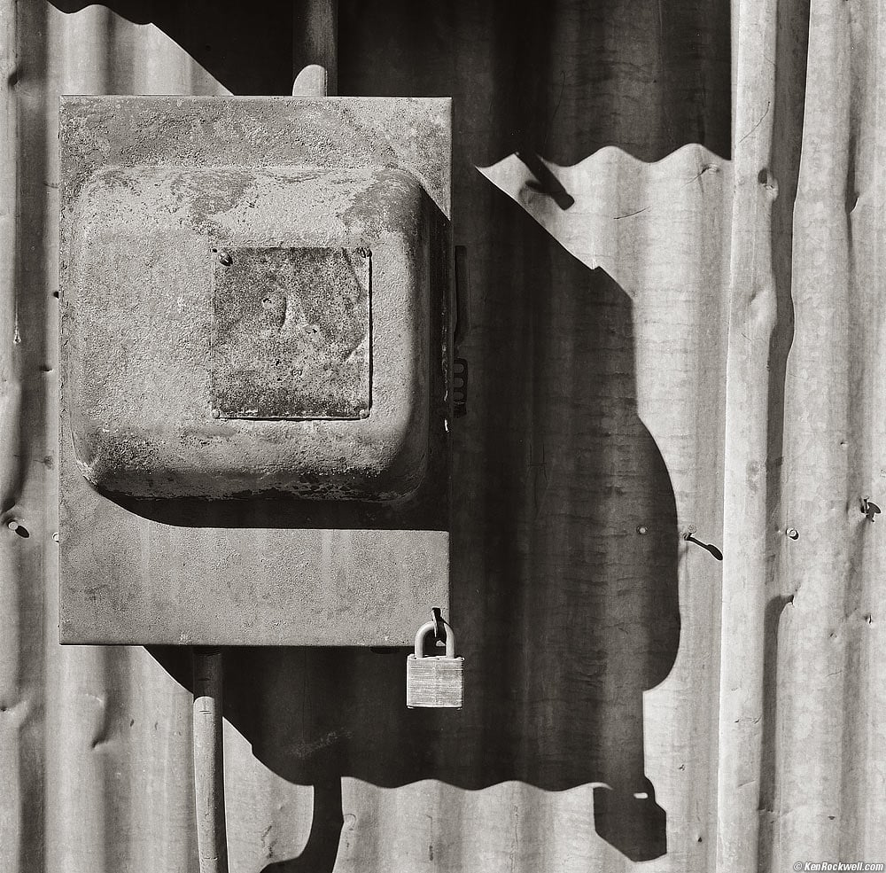 Electrical Breaker Box on Old Tin-Walled Building in Black-and-White
