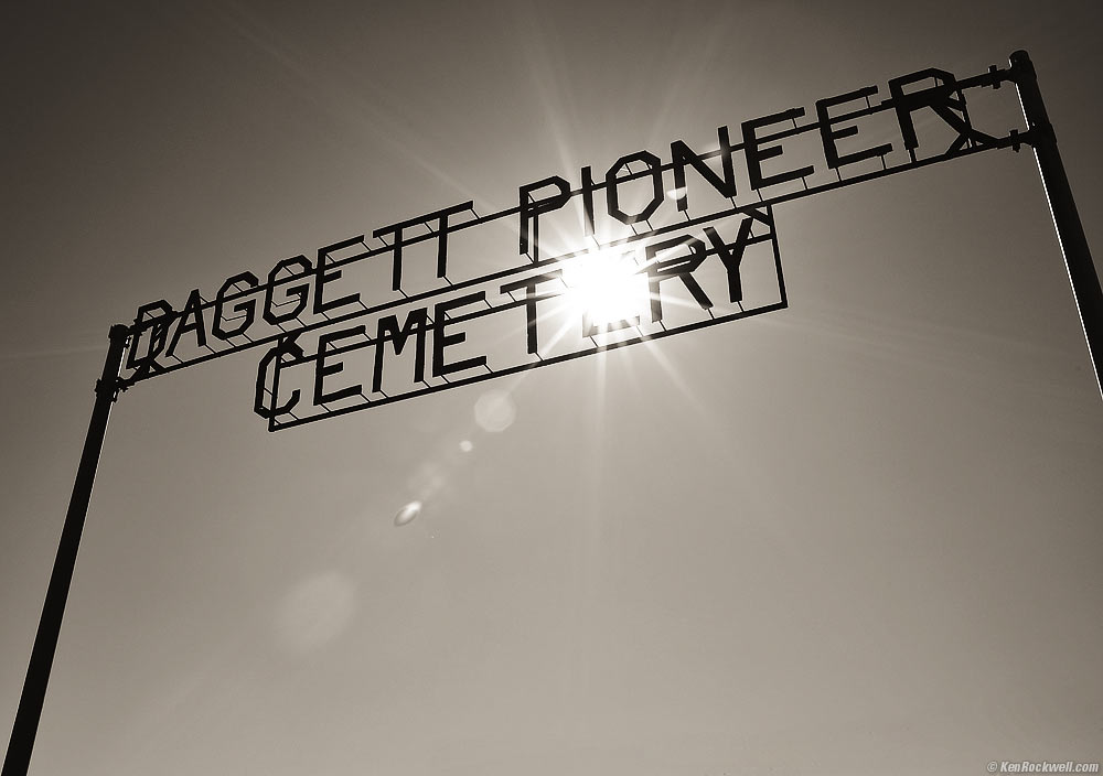 Sun Shining Through Daggett Pioneer Cemetery Sign