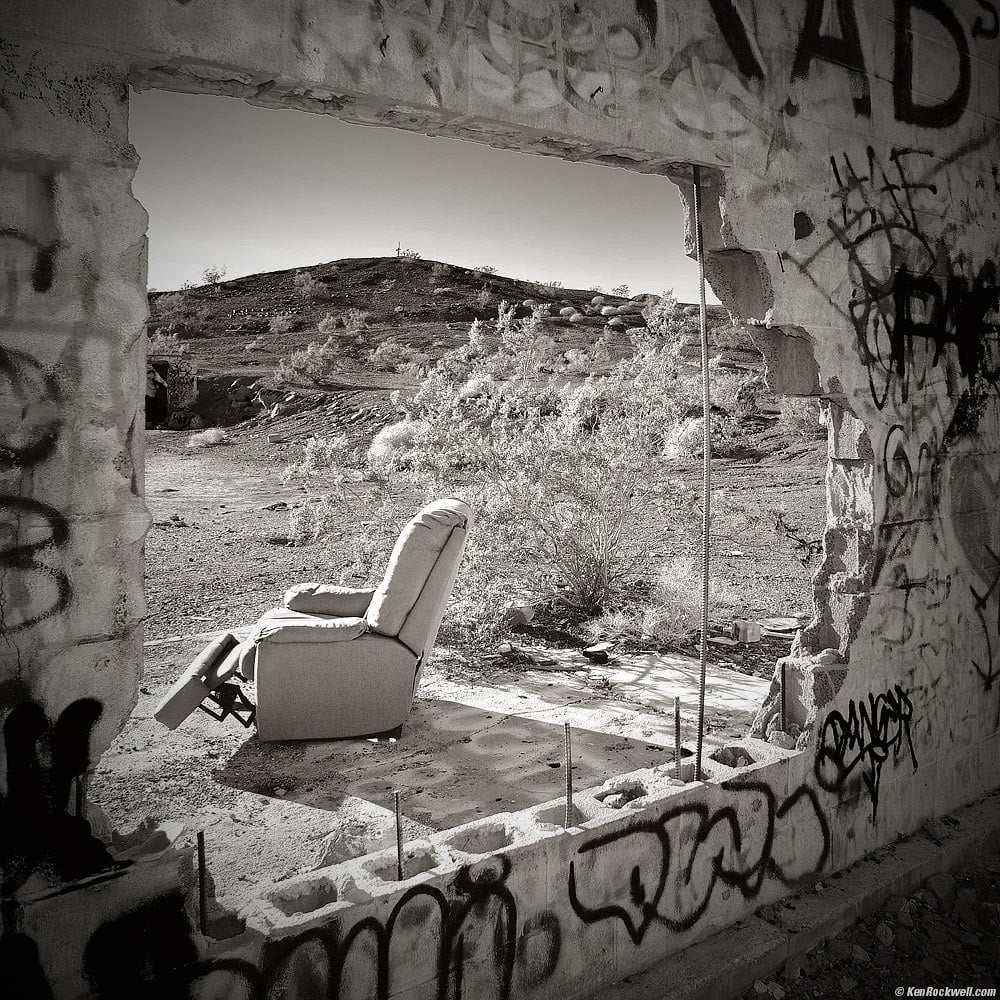 Lonely Old Recliner as Seen Through Huge Gaping Hole in Route 66 Cinder-Block Wall in Black-and-White