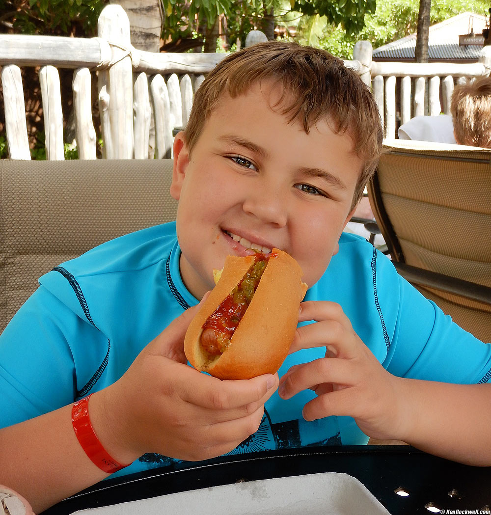 Ryan eats a hot dog